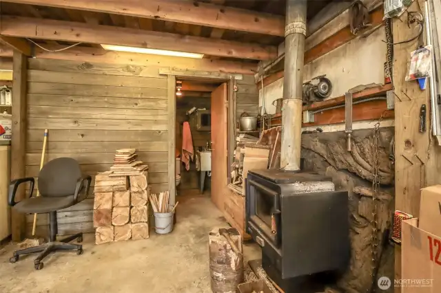 Shop has wood burning stove and 3/4 bath!
