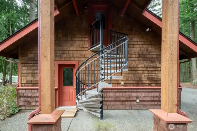 Spiral stairs to bonus room above garage