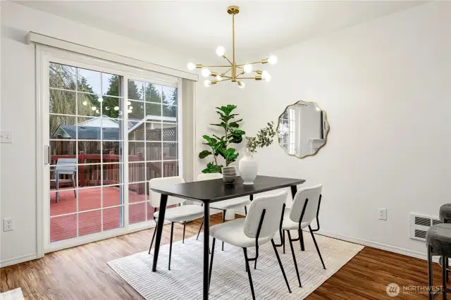 Dining area with access to patio. Perfect for outdoor dining!