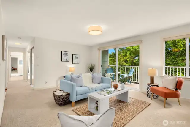 Spacious living room with new carpet and paint