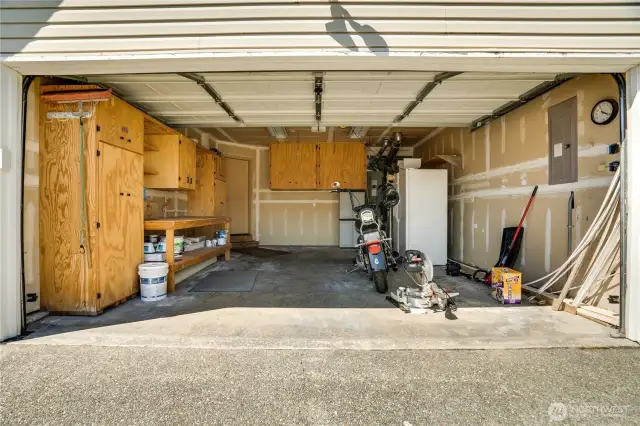 Two car attached garage. Great built in storage. Safe is available for purchase but otherwise will not convey with home.