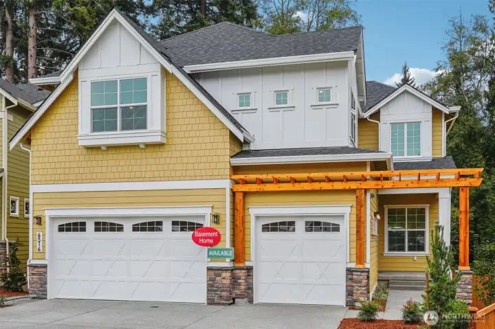 The 4052 plan is 3739 sft, 3-car garage & 3.5 bth.  5-6 bdrms with full basement.  Basement includes a bdrm, rec room and bathroom. Private lot. Pic is a rendering of the home.