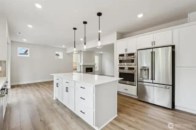Kitchen - Refrigerator is NOT included. Picture is of another home, color and materials will vary.