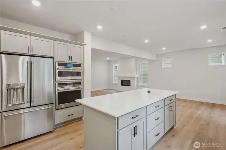 Open kitchen to nook and greatroom.