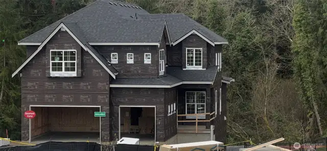 The 4052 plan is 3739 sft, 3-car garage & 3.5 bth.  5-6 bdrms with full basement.  Basement includes a bdrm, rec room and bathroom. Private lot.