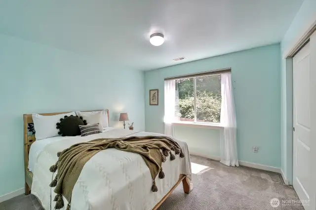 This is one of two bedrooms located at the back of house.