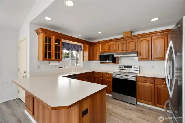 New LVP flooring in kitchen, dining and entry.