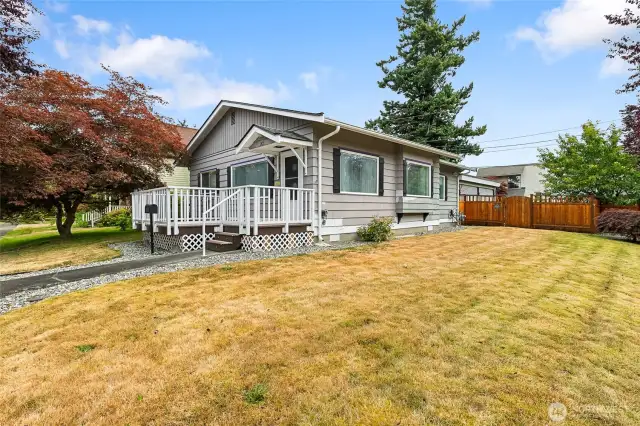 Large lot and partially fenced in yard with a rock garden for you to enjoy.