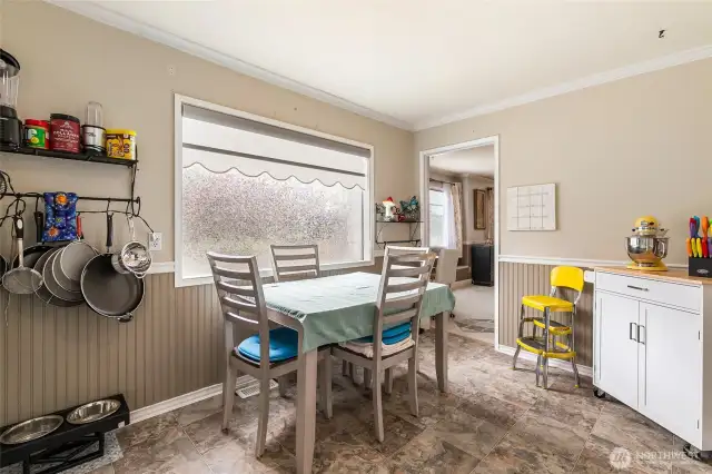 An eat-in kitchen with space for your dining table.