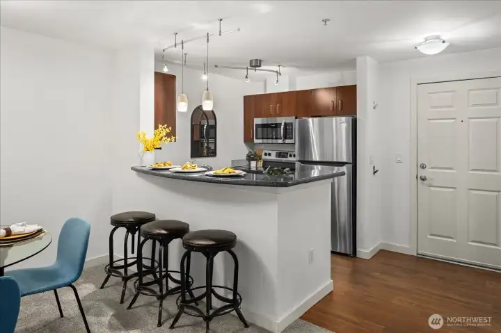 Breakfast bar in the kitchen for additional seating.