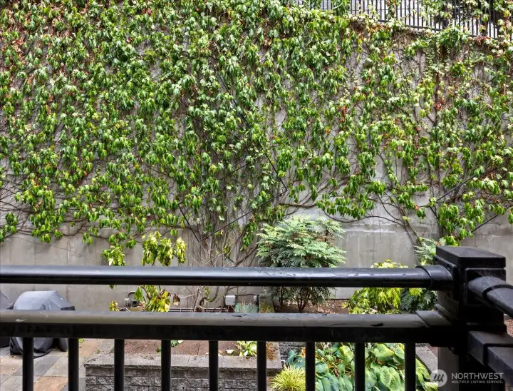 Juliet balcony overlooking the private gated courtyard.