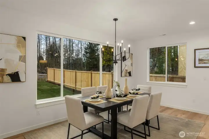 Photo of completed model home on Homesite 11. Color & Selections may vary.