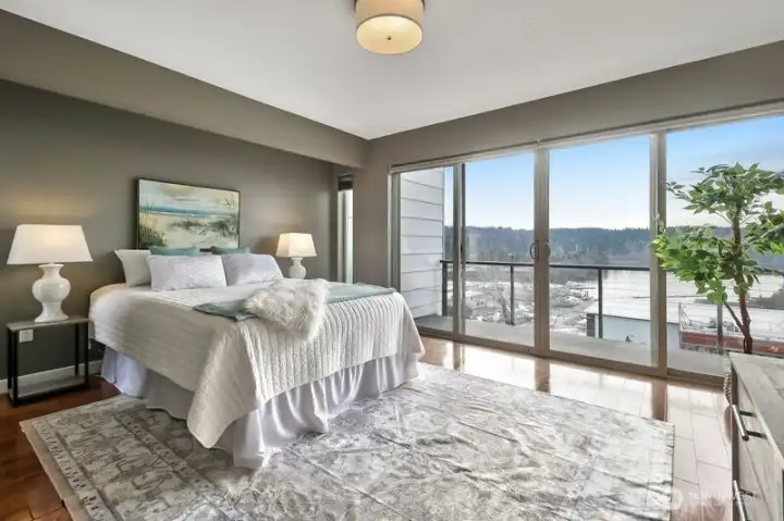 Enter the sumptious primary bedroom and be greeted once again by outstanding views of Lake Washington.
