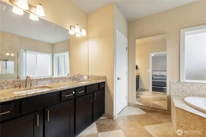 Just off the primary suite is your impressive 5-piece bathroom.