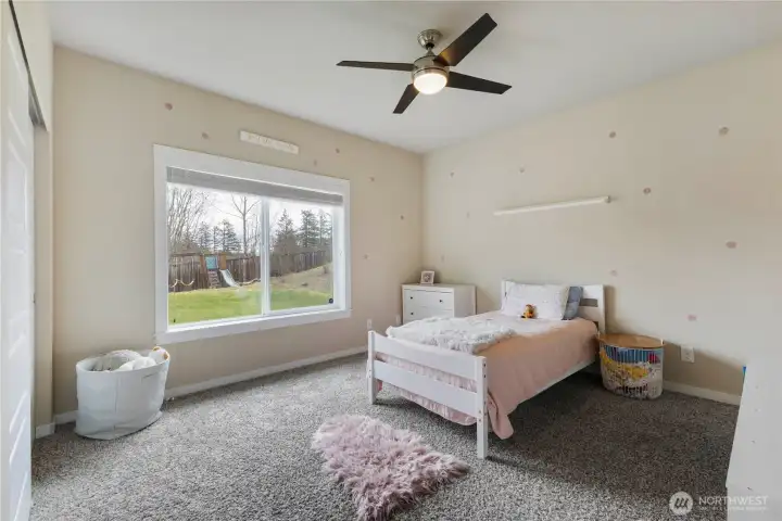 This is Bedroom #1 on the opposite side of the house. (Those are easy to peel off decals on the walls.)