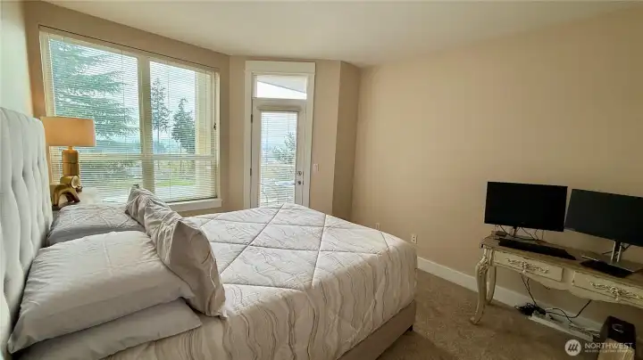 Large Windows and Door To Balcony