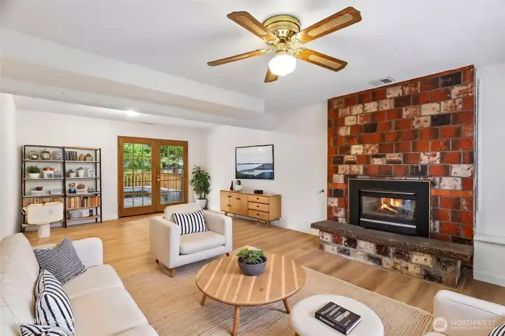 family room on lower level with access to yard
