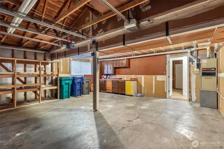 Large 2 garage with work bench and storage