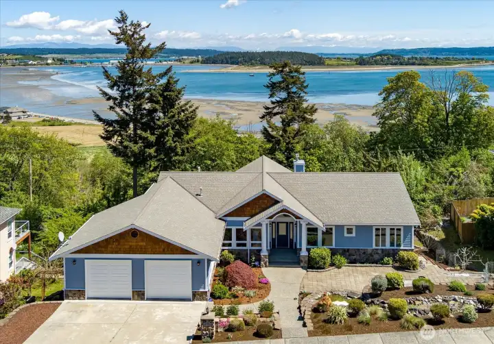 Welcome to elevated living where you'll enjoy views of Oak Harbor Bay, Camano Island, and Cascade Mountain Range. Gorgeous!