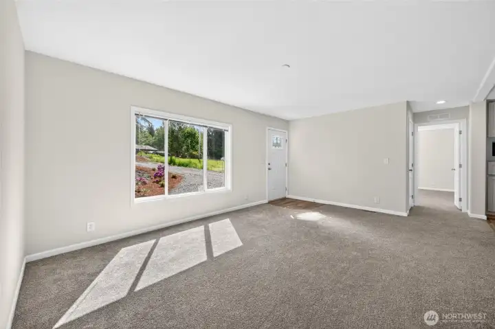 family room, windows have blinds.