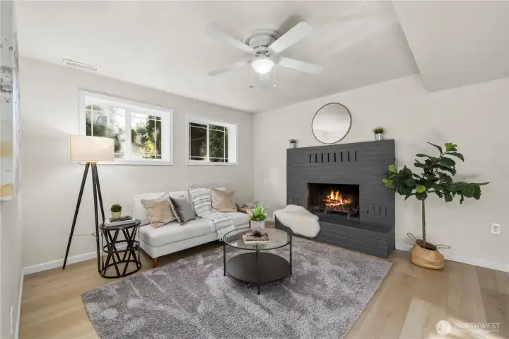 Downstairs family room w/ cozy fireplace Downstairs family room w/ cozy fireplace