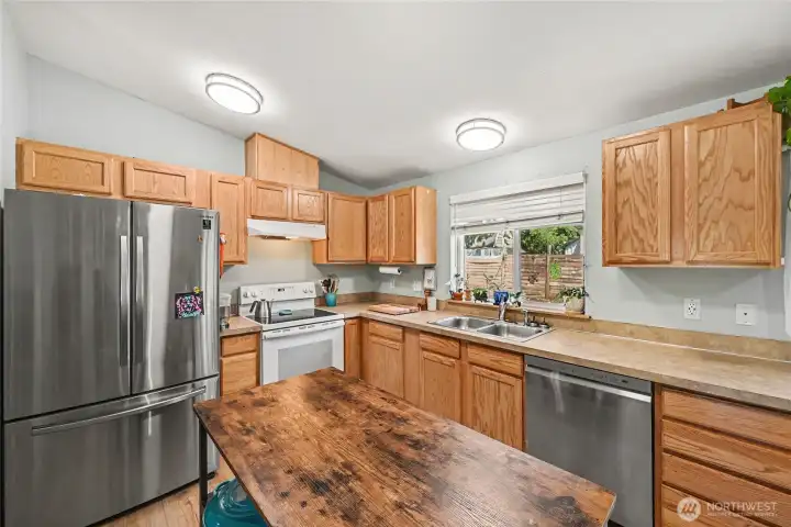 Plenty of counter space with ample cabinet storage.