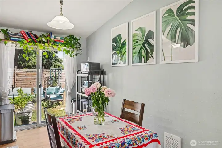 Dedicated dining area. A sliding door off the dining area provides easy access to the backyard, perfect for entertaining or enjoying the outdoors.