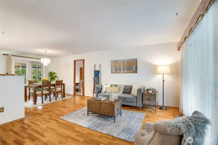 The house is arranged on one level, with the bonus room just a couple of steps down from this main living space. The house is arranged on one level, with the bonus room just a couple of steps down from this main living space.