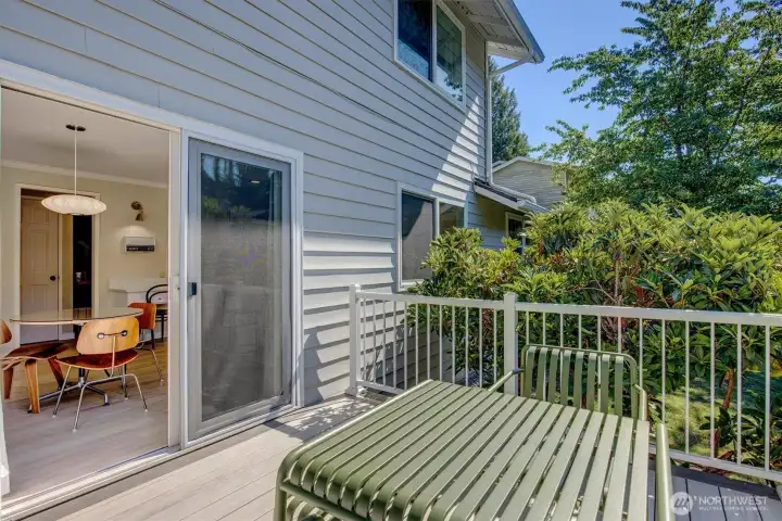 TimberTech deck with seamless access to the kitchen through a sliding glass door.