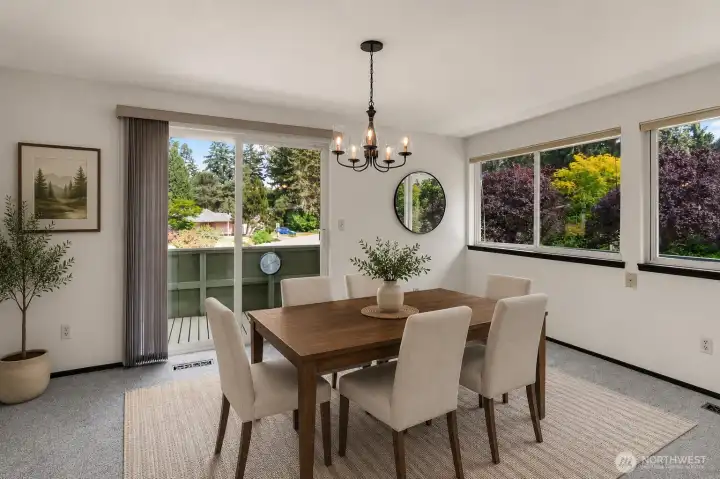 Large slider with access to the front deck. *Virtually staged* Large slider with access to the front deck. *Virtually staged*