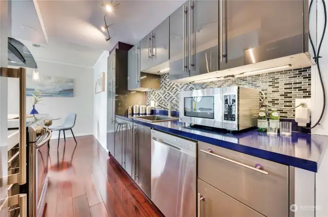 Plenty of counter space for cooking & yes, the microwave stays in the home.