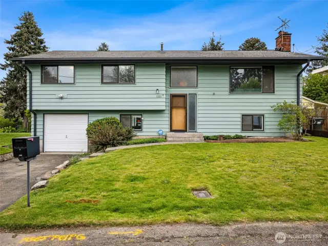 ONE_OWNER since new in 1961. 3 bedrooms, 1 3/4 baths, beautiful oak hardwood floors upstairs, lovingly cared-for all these years. Triple pane vinyl windows, 2 wood burning fireplaces, large recreational room with wet bar. Uniquely still original.  Must See and bring your updating ideas.