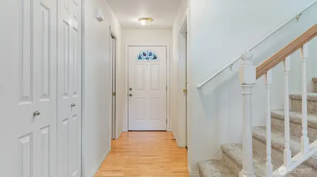 Entry and Kitchen have hardwood maple floors
