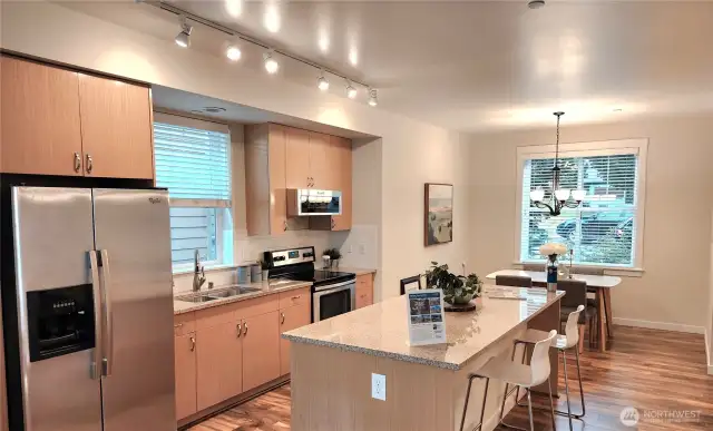 Kitchen and Dining with Large Granite Island.