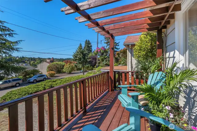 Relax on the front deck looking west to wonderful sunsets in the panoramic territorial view.