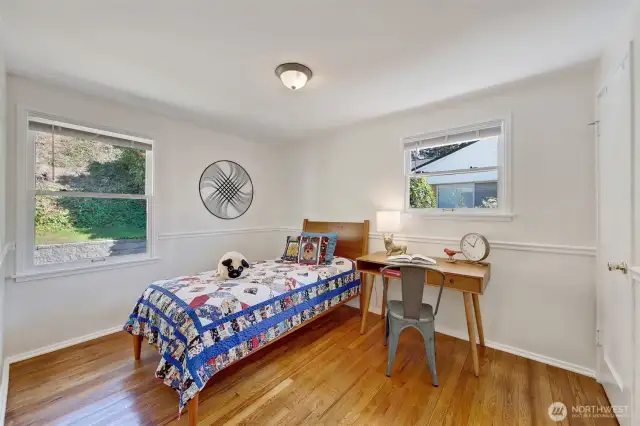 Bedroom in SE corner with view to back yard.
