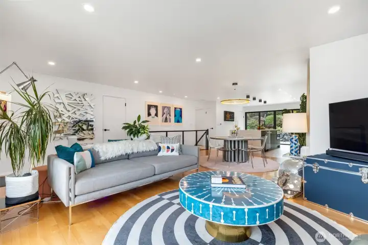 Open living layout with a seamless flow from living and dining into the huge kitchen.