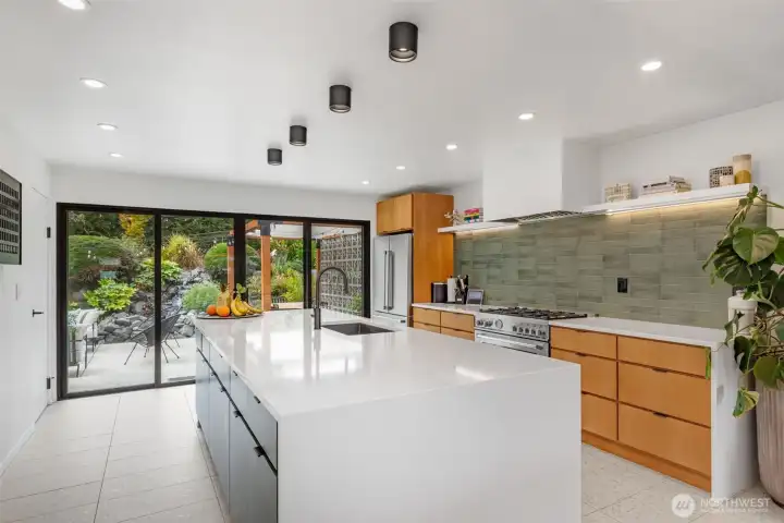New kitchen from Founders Choice built in Tacoma with solid wood fronts, dovetail joints and soft close feature. Quartz countertops with double waterfall, breakfast bar, microwave drawer and pantry.