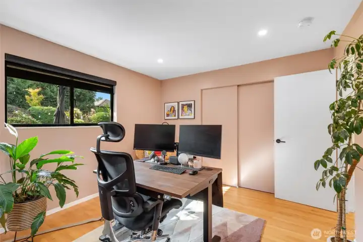 2nd bedroom on the main floor makes a wonderful home office with corner windows to take in the lush surrounding scape. Fully wired with Ethernet for faster internet around the house.