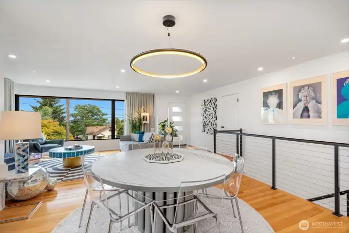 Generous dining area at the center of it all with a new custom staircase to open the space.