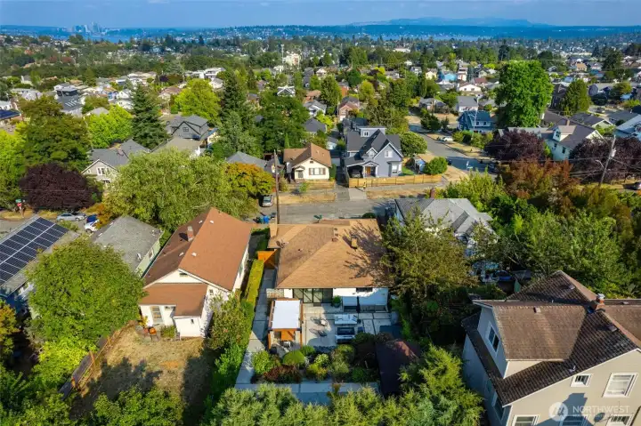 Great perspective of the useable lot and the big views to Bellevue and beyond from the front of the home.