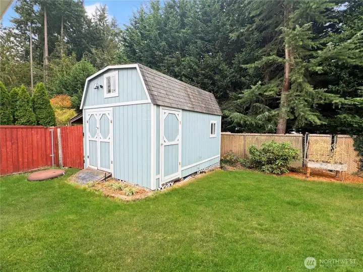 Plenty of storage with this huge shed with tall ceilings