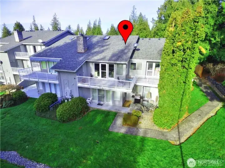 Located on 3rd fairway- condo is entire upper unit pictured