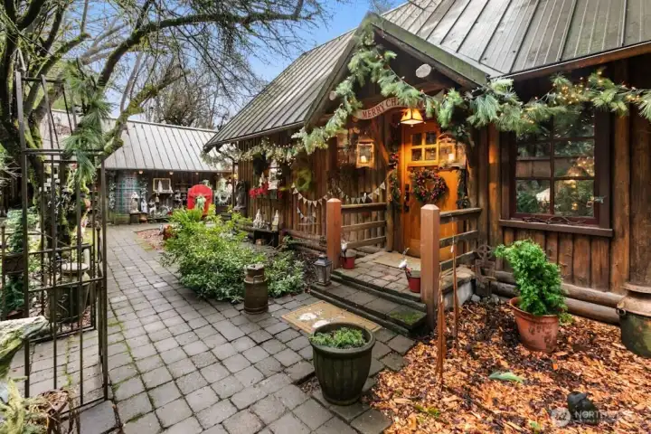 1936 built Canadian Vertical log home is as charming as it can be!