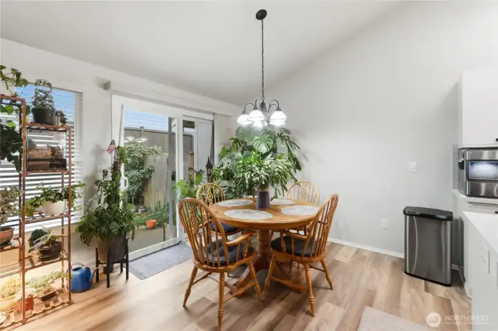 Eat-in dining area and a closer look at the sliding door with views out to your private yard.