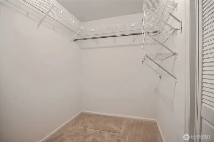 Primary walk-in closet.