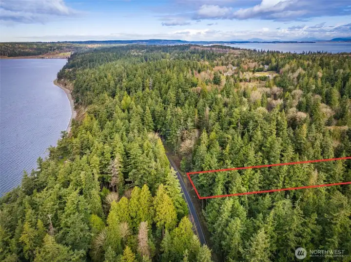 Facing North. Lot lines are approximate, buyer to verify.