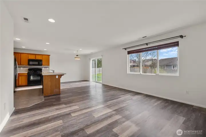 Open floor plan with access to the spacious backyard and patio.