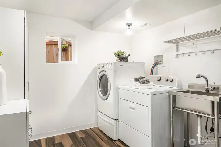 Large laundry room downstairs.