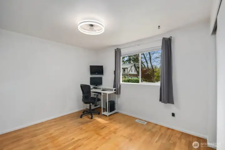 2nd Bedroom with Ceiling Fan and Hardwood Floors.